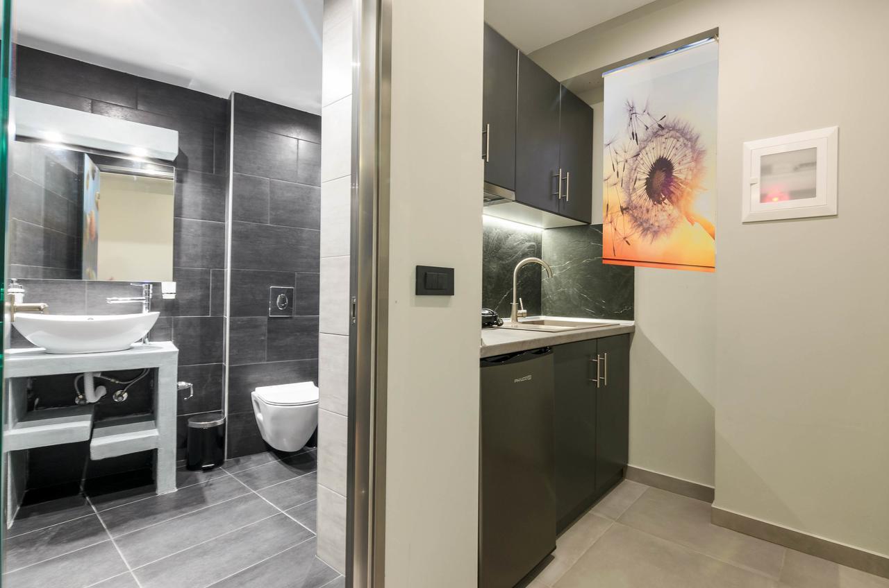 Artemis Apartments Kypseli Bagian luar foto